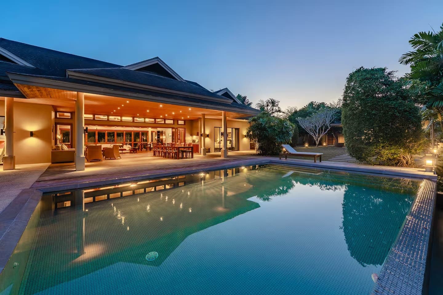 Luxury pool villa at dusk under Empire Estates villa management in Phuket